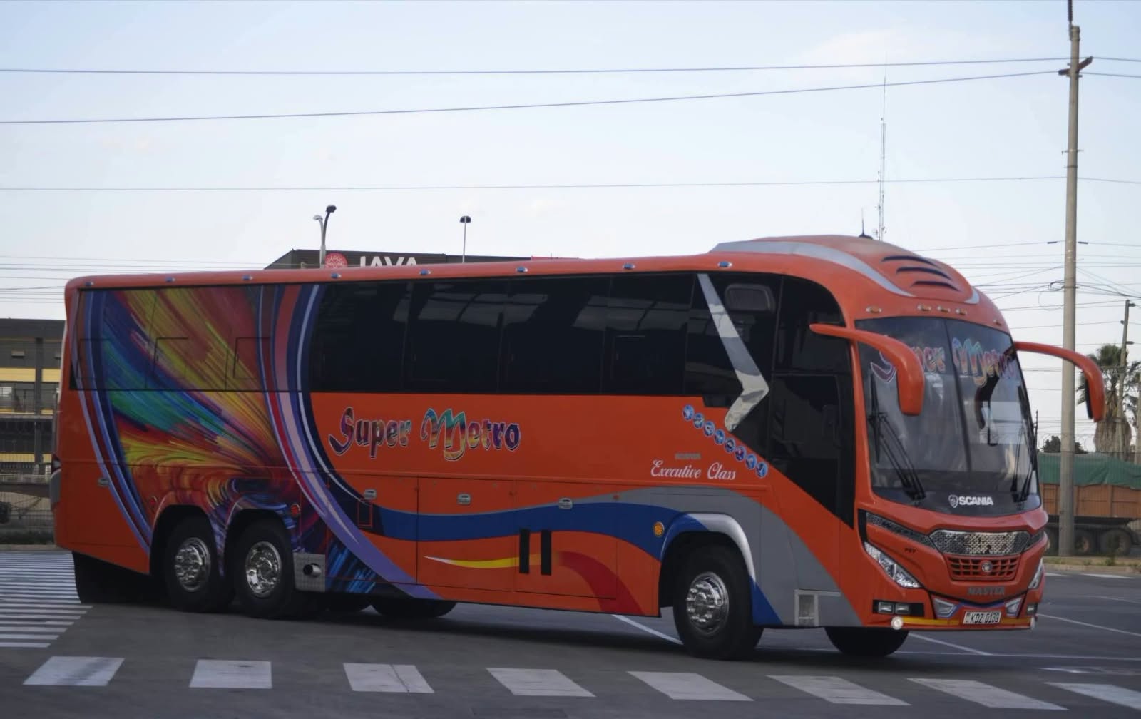 Super Metro coach parked at night